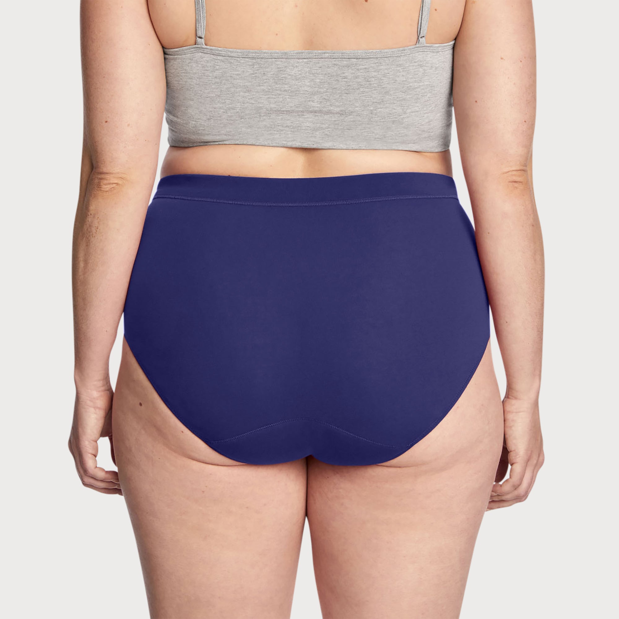 back view of thinx everyday hiwaist in indigo