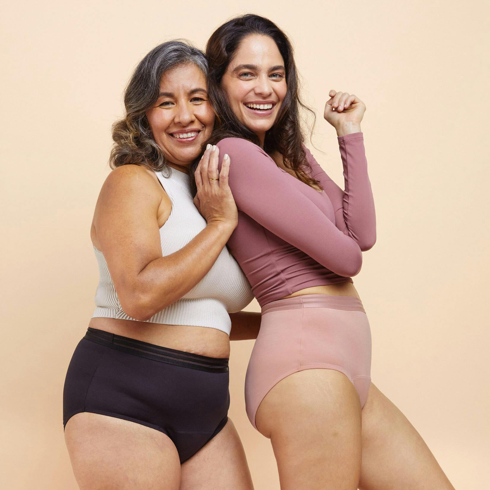 An image of 2 women wearing different Thinx for All Leaks styles in Hi-Waist.