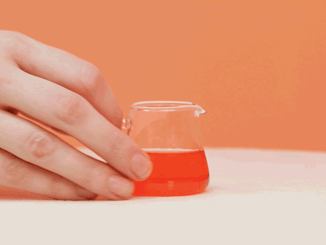 An animated gif showing liquid being poured into the gusset of Thinx for All showing the underwear's absorbent qualities.