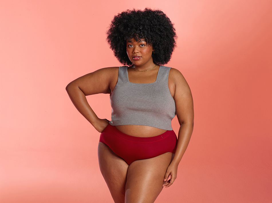 An image of 1 woman wearing a Thinx for All style, red Everday Comfort Hi-Waist.